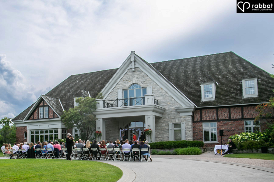 Outdoor wedding ceremony at King Riding Golf Club.