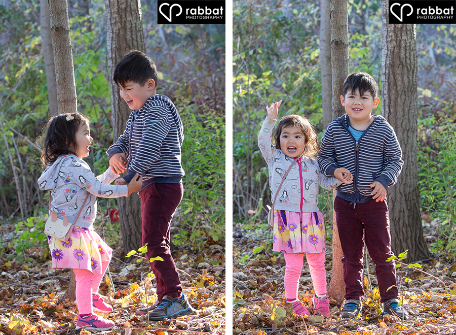 Siblings playing in the leaves. Family portraits.