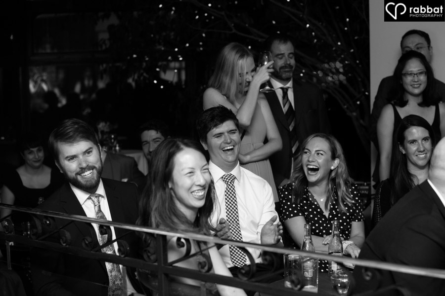 Guests laughing at speeches