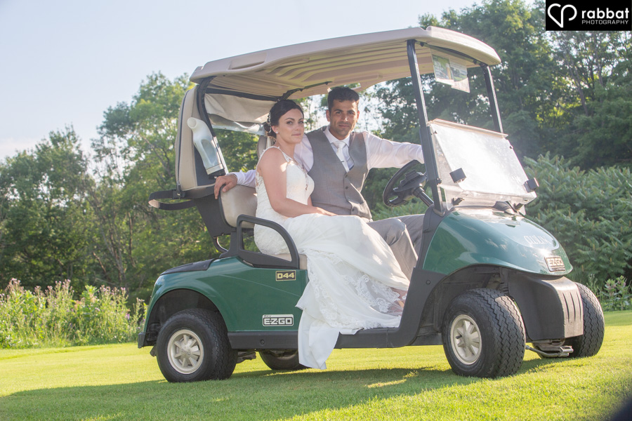 Couple in a golf cart at King Riding Golf Club