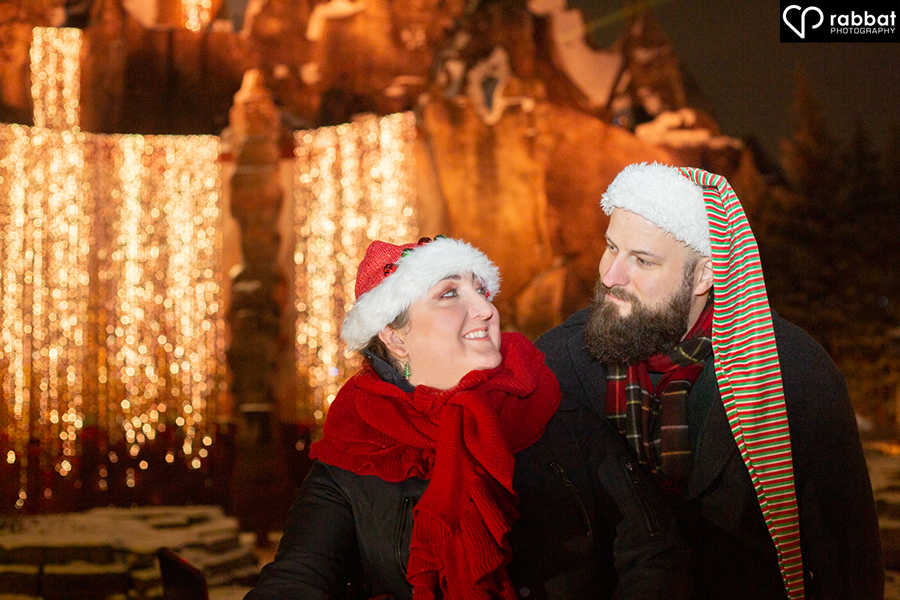 Romantic photo in front of lit up Wonder Mountain at night. Canada's Wonderland Winterfest.