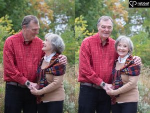 Senior couple holding hands and looking at each other in vertical photo on left. He is wearing a red button up shirt. She is wearing a light brown sweater with a plaid scarf on top. In the photo on the right they are holding hands and looking at the camera.