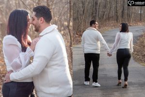 Two vertical photos side by side. In the one on the left, the woman is on the left and the man is on the right. They are hugging each other around the waist. They are head to head. In the photo on the right, they are holding hands and walking down the forest path.