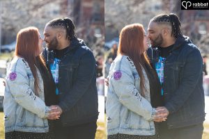 Two side by side vertical photos of a backlit couple outside and about to kiss. They are looking at each other in the photos. Woman is wearing a jean jacket, short skirt and black boots with white socks. Man is wearing a jean jacket, T-shirt and jeans. Man is Black and woman Metis but has a light complexion with red hair.