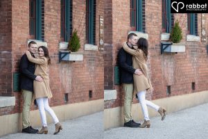 Two side by side vertical photos of a couple against a brick wall. He is wearing beige pants and a dark coat and she is wearing brown suede low-cut boots, white pants, and a brown coat. Their arms are wrapped around each other in both photos. Her left is up as she hugs him in the photo on the right.