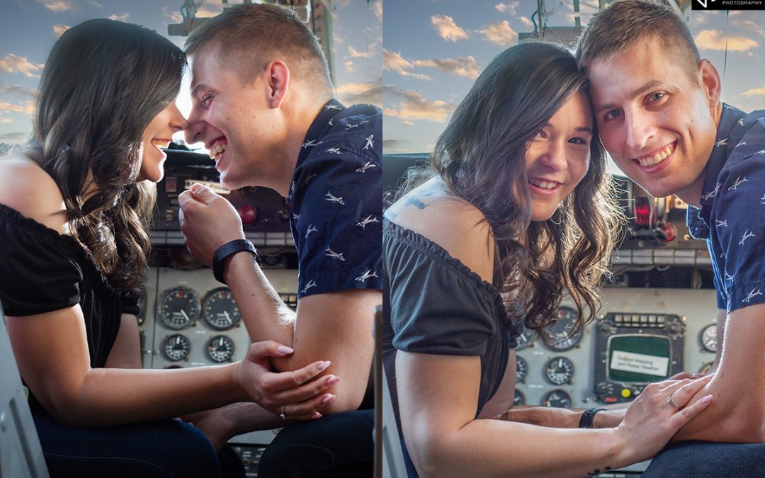 Engagement photos in an airplane cockpit